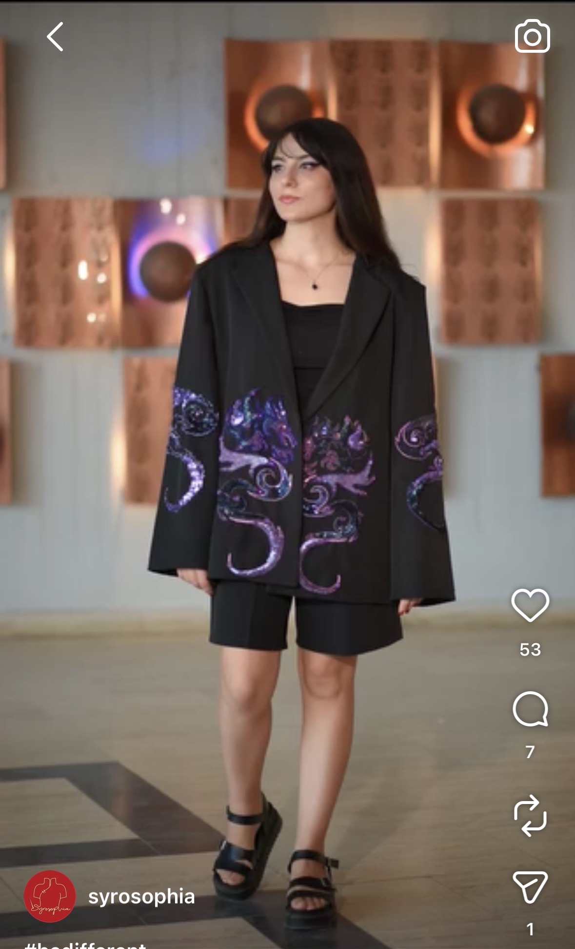 Black tailored jacket with purple embroidered organic motifs